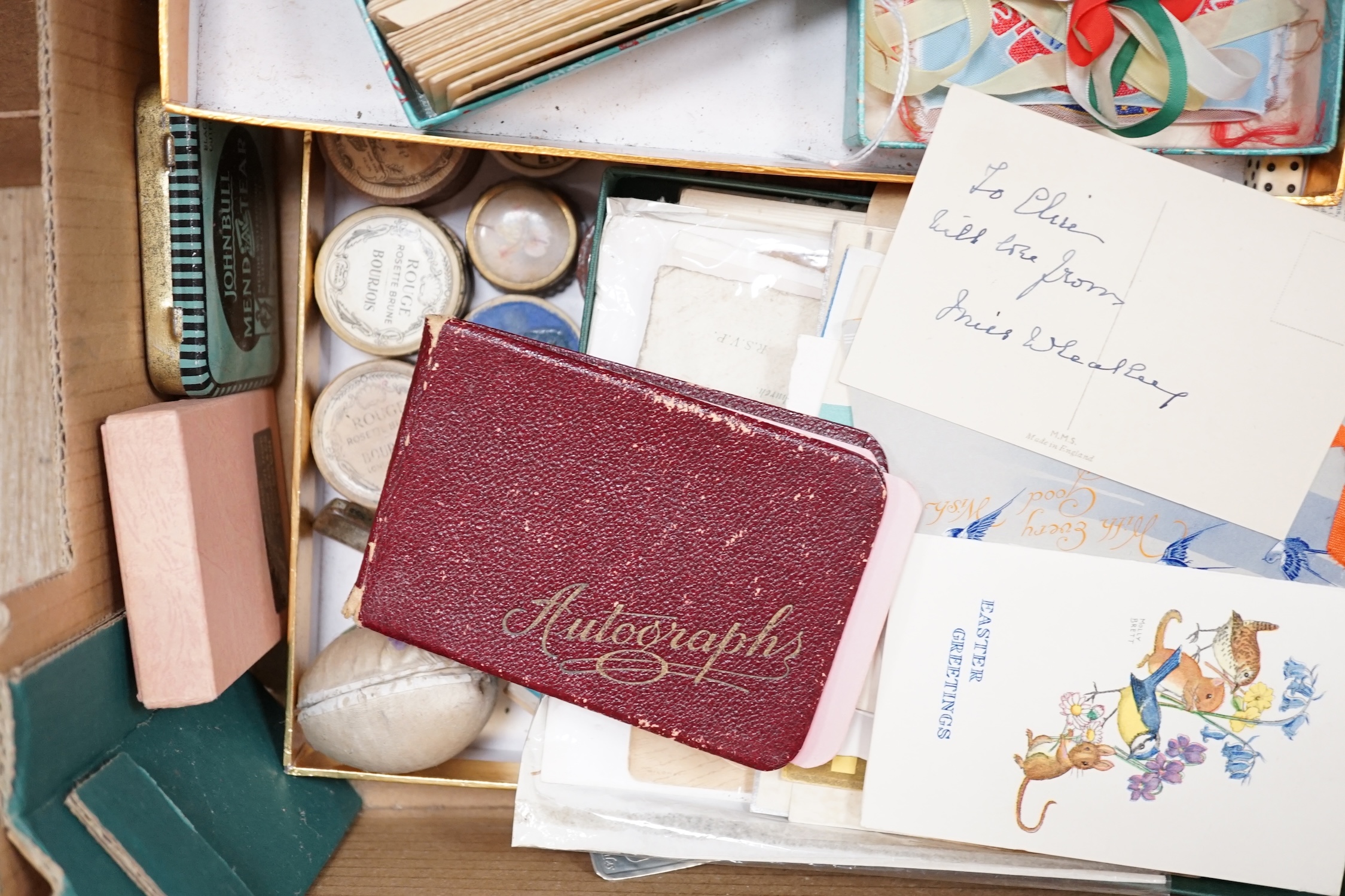A collection of old advertising rouge boxes, button boxes, mixed sewing cases, cards and a mid 20th century autograph album. Condition - varies